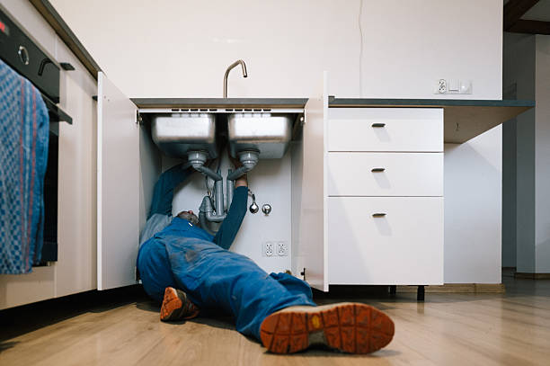Professional Emergency Plumber technician working in Montezuma, GA